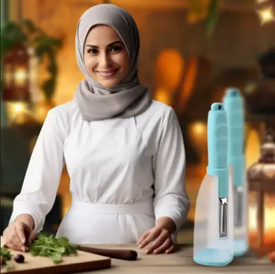 مقشرة خضار وفواكه مع حاوية - أخضر